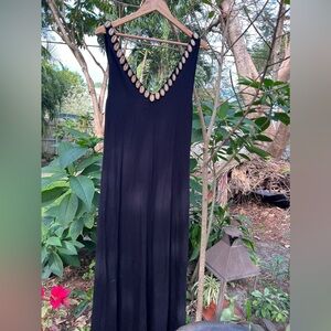 Gorgeous maxi dress by Eco Gypsy has super low cut back with real cowry shells